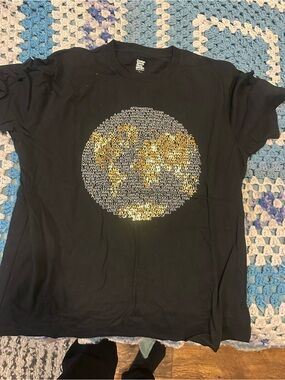 Black Graphic T-Shirt with Gold Text Circle